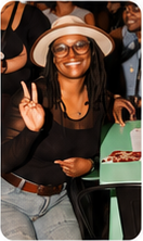 BLAQTOBERFEST attendee smiling at a community event